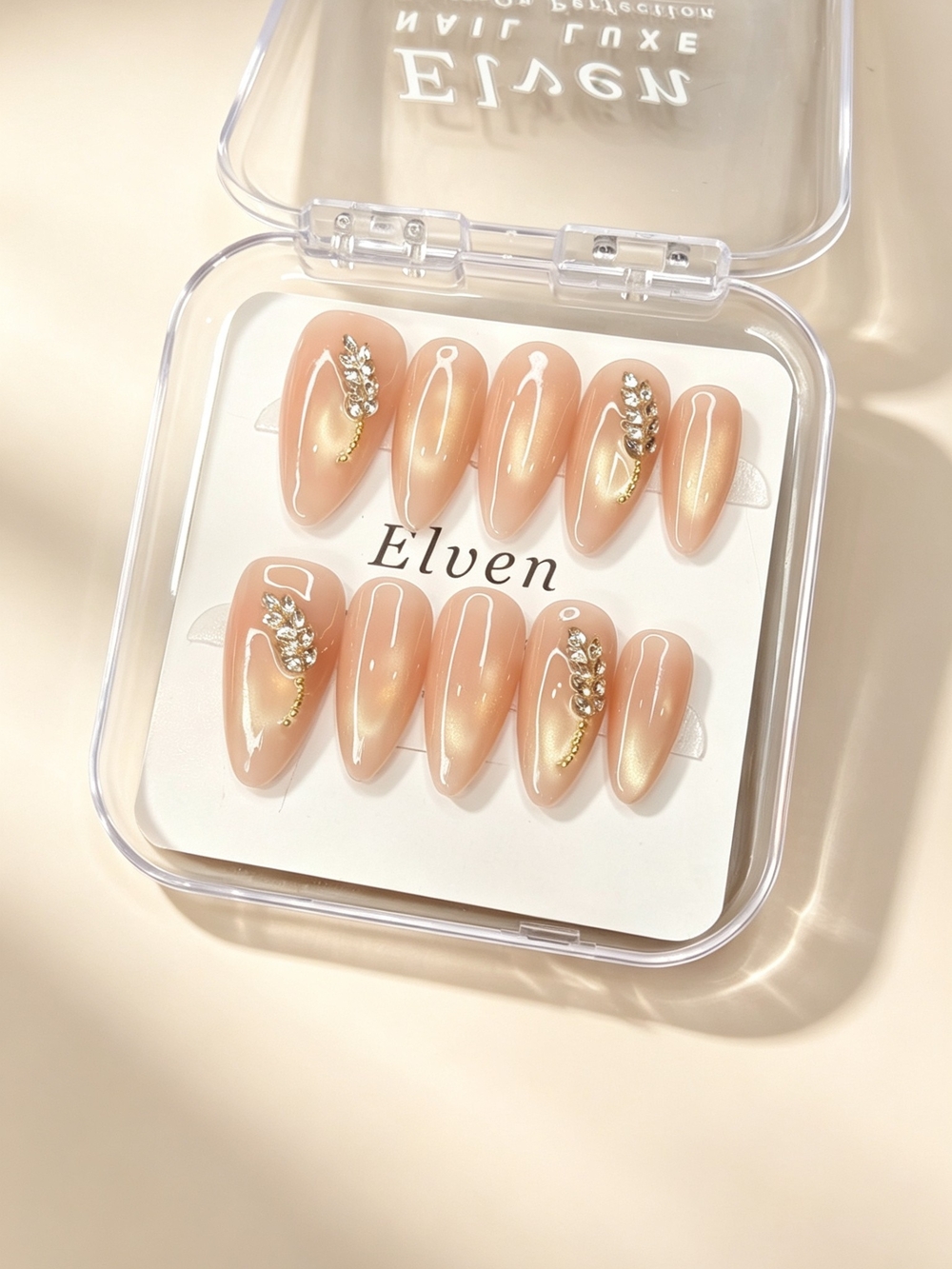 Pink Gold Cat Eye Press On Nails With Crystal Feather Accents Medium Almond Nail